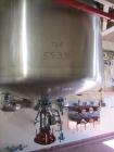 Used Tycon Glass Lined Reactor, 700 Gallon / 2,649 Liters.  Type 808 Glass. Internal rated 150 psi and full vacuum at 450 degrees F, jacket rated 100 psi at 450 degrees F. Full clamp top with air ope...