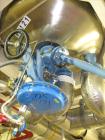 Used Tycon Glass Lined Reactor, 50 Gallon, Type 808 Glass. Internal rated 150 psi and full vacuum at 450 degrees F, jacket rated 110 psi and full vacuum at 450 degrees F. Full clamp top,  3 blade ret...