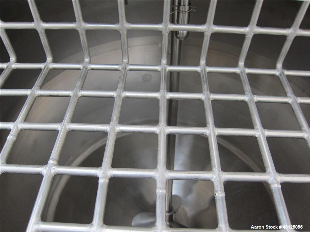 Used 300 liter HM Rustfri kettle, stainless steel construction, jacketed for 2.7 bar(39 psi at 150 c, top entering .75 kw Ekato agitator, model FGL-25D, on 2 legs, serial# FS-1210A, built 2011.