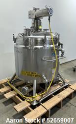 Used-DCI Stainless Steel Jacketed Reactor, 200 Gallon. Has top-entering Pharmix agitator, model 4000K. Internal rated 15 PSI...