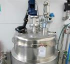 Used 300 liter HM Rustfri kettle, stainless steel construction, jacketed for 2.7 bar(39 psi at 150 c, top entering .75 kw Ekato agitator, model FGL-25D, on 2 legs, serial# FS-1210B, built 2011.