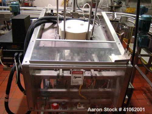 Used Retort Line Consisting of the Following Equipment:  (2) Allpax retorts, 1300SS; Allpax loader; Allpax unloader; Allpax retort baskets and carts; Arpac shrink tray wrapper; Axon EZ-Seal EZ-130 sl...