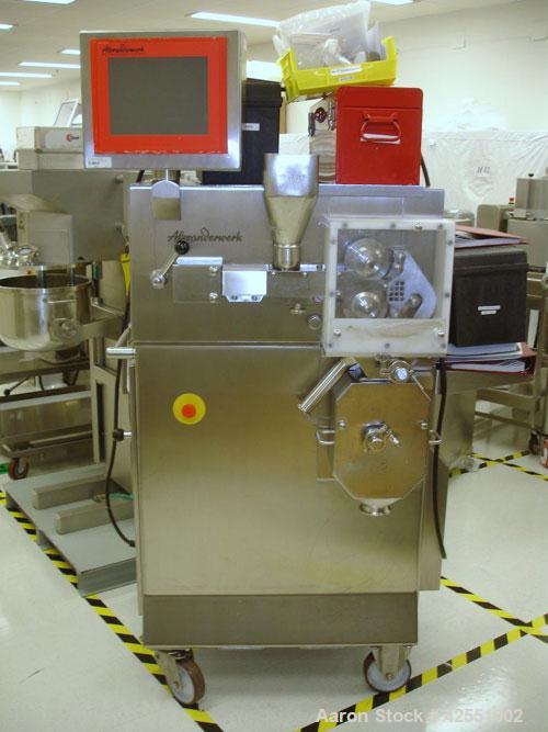 Used Alexanderwerk Roller Compactor, Model WP120V Pharma, Stainless Steel. Horizontal screw feeder with pre-breaker, cantilevered rolls, flake crusher, pre-granulator and fine granulator attachments,...