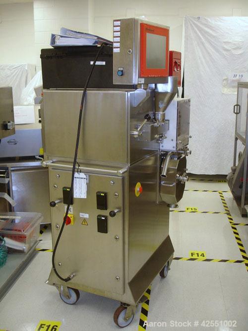 Used Alexanderwerk Roller Compactor, Model WP120V Pharma, Stainless Steel. Horizontal screw feeder with pre-breaker, cantilevered rolls, flake crusher, pre-granulator and fine granulator attachments,...