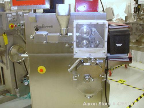 Used Alexanderwerk Roller Compactor, Model WP120V Pharma, Stainless Steel. Horizontal screw feeder with pre-breaker, cantilevered rolls, flake crusher, pre-granulator and fine granulator attachments,...