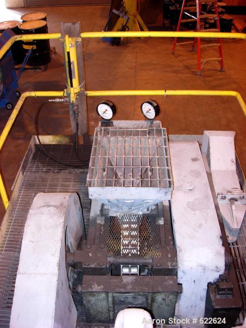 USED: Bepex K & G model MS briquette press. Stainless steel rolls(2) 20.5" diameter x 4" face. The rolls are 2 pockets wide with 2 rows of 32 pockets around the circumference. The rolls have pillowsh...