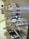 Used Alexanderwerk Roller Compactor, Model WP120V Pharma, Stainless Steel. Horizontal screw feeder with pre-breaker, cantilevered rolls, flake crusher, pre-granulator and fine granulator attachments,...
