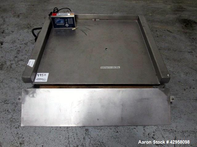 Used Indiana Scale Floor Scale. 42" x 42" Platform, stainless steel construction, 2000 pound capacity with Mettler-Toledo readout/controls, with ramp.