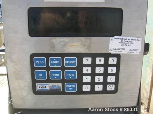 USED: Fairbanks platform scale, 1000 pound capacity, model H90-165. 23" x 27" 304 stainless steel platform. Includes a GSE model 550 readout. Mounted on casters.
