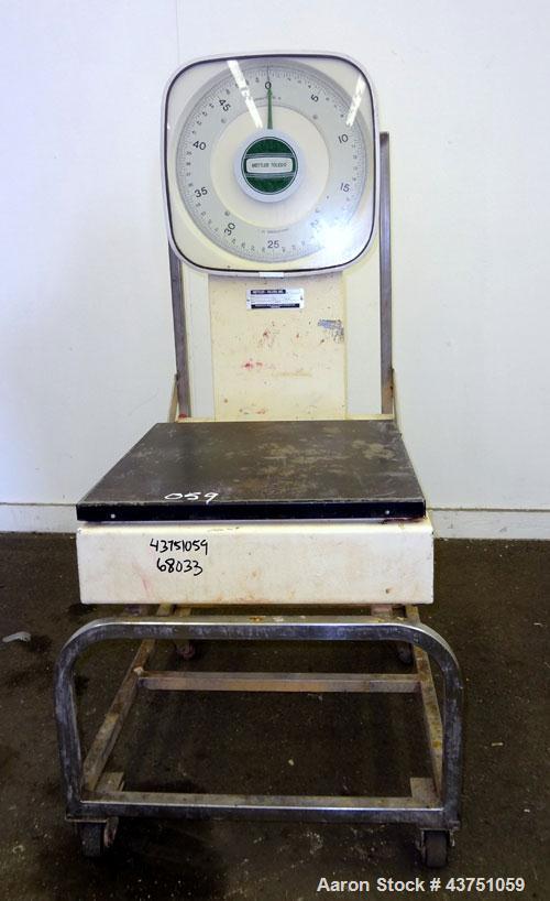 Used Mettler Toledo Mechanical Dial Scale, Model 2020. 50 Pound capacity. 19" x 20" Stainless steel platform. Mounted on a frame with casters.