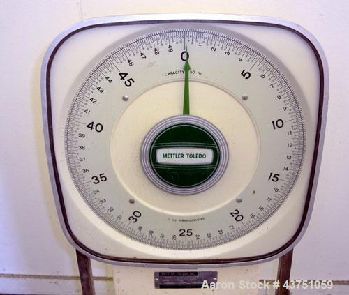 Used Mettler Toledo Mechanical Dial Scale, Model 2020. 50 Pound capacity. 19" x 20" Stainless steel platform. Mounted on a frame with casters.