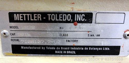 Used Mettler Toledo Mechanical Dial Scale, Model 2020. 50 Pound capacity. 19" x 20" Stainless steel platform. Mounted on a frame with casters.