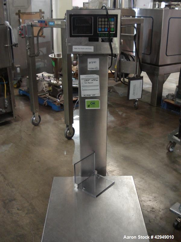 Used Mettler-Toledo Scale, Type M-8142. 24" x 30", serial# 4151544-4ym. NOTE PRICE INCLUDES A 15% BUYERS PREMIUM.
