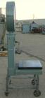 Used Toledo Scale, Model 2081. 125 pound capacity. 20'' x 20'' platform. Mounted on a cart with casters.