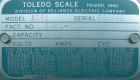 Used Toledo Scale, Model 2081. 125 pound capacity. 20'' x 20'' platform. Mounted on a cart with casters.