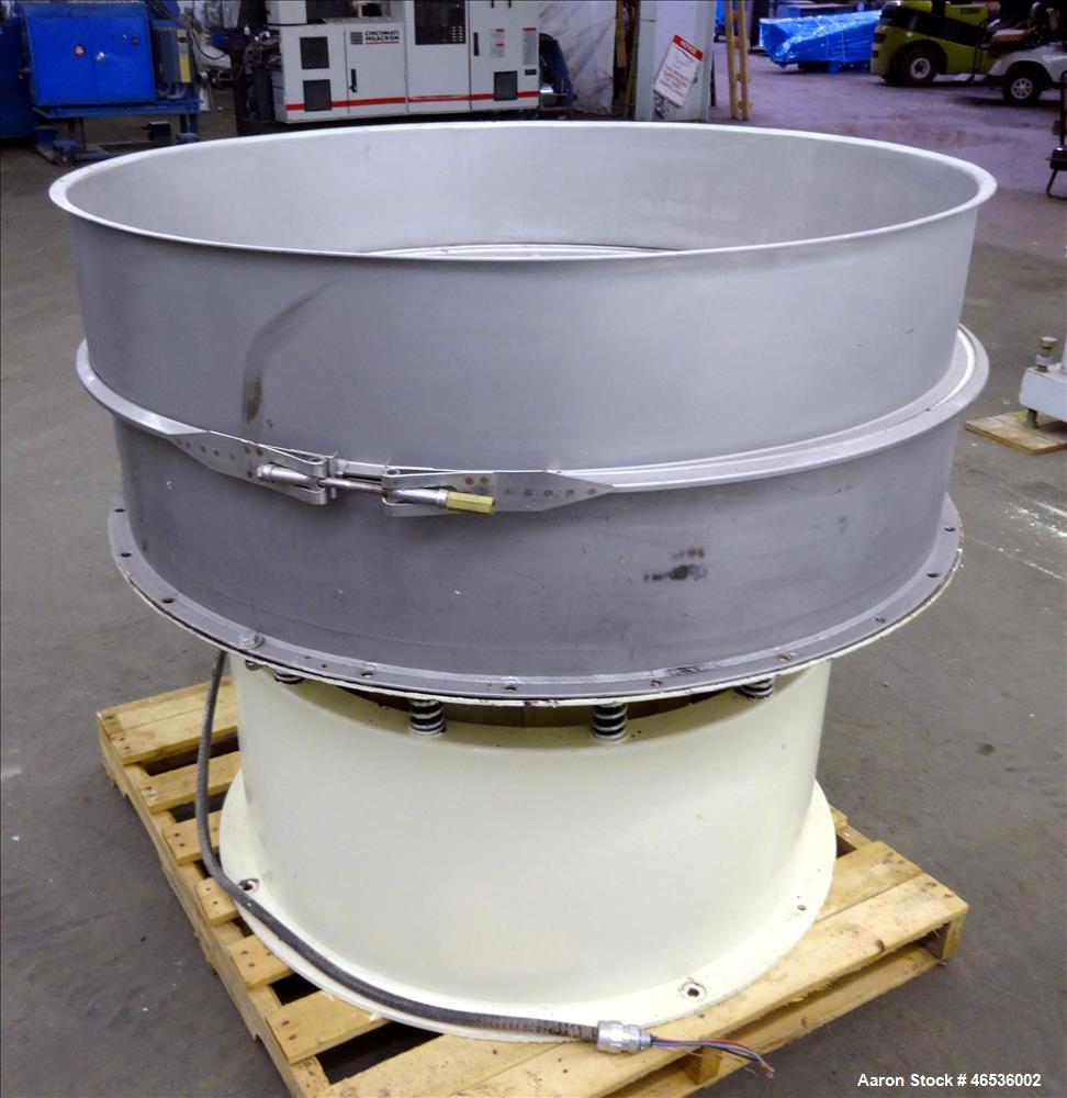 Used Midwestern Industries Screener, 48" Diameter, 304 Stainless Steel. Single deck, 1 separation. No top cover. Driven by approximate 2-1/2 hp motor. Mounted on a carbon steel base.