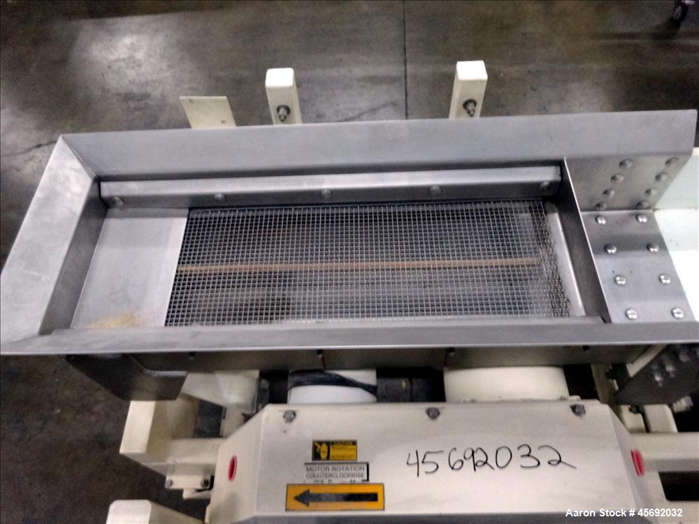 Used Eriez Model TMS12X96 HI-VI Vibratory Rectangular Screener. Screen size: 24" long x 9-1/2. 6" diameter out feed. 1-1/2 hp, 1725 rpm, 3/60/208-230/460, Baldor motor. Serial Number 11837. Built 200...