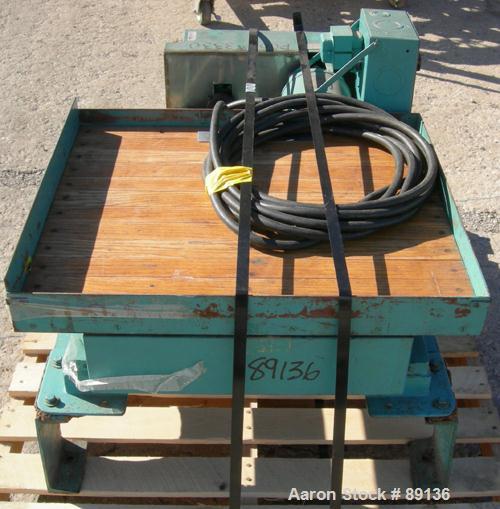 USED: Gaynes Engineering shaker table, model V100, carbon steel. 24" wide x 28" long wooden deck, approximate 100 pound capacity. Driven by a 1/2 hp, 3/60/208-220/440 volt, 1725 rpm motor.