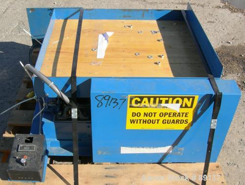 USED: Gaynes Engineering shaker table, model V100, carbon steel. 24" wide x 28" long wooden deck, approximate 100 pound capacity. Driven by an approximate 1/2 hp motor.