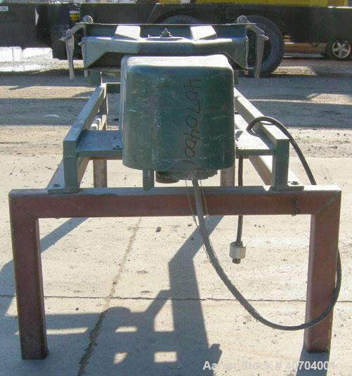Used Rotex Screener, model 12, carbon steel. 20" wide x 37" long double deck, 3 separation. No top cover, 3 bottom outlets. 5.1 square feet screen area, 2" screen motion. Driven by a 1/2 hp, 3/60/208...