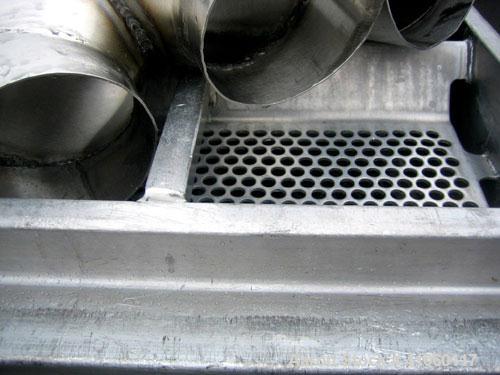 Used Rotex Screener, Model 12, Stainless Steel. 20" wide x 37" long double deck, 3 separation. Top cover, 3 bottom outlets. 5.1 square feet screen area, 2" screen motion. Driven by a 1/2 hp, 3/60/230...
