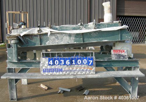 Used Rotex screener, model 42GP, carbon steel. 40" wide x 84" long double deck, 3 separation. Clamp down top cover, 3 bottom outlets. 23.3 square feet screen area. Driven by a 2 hp, 3/60/208-230/460 ...