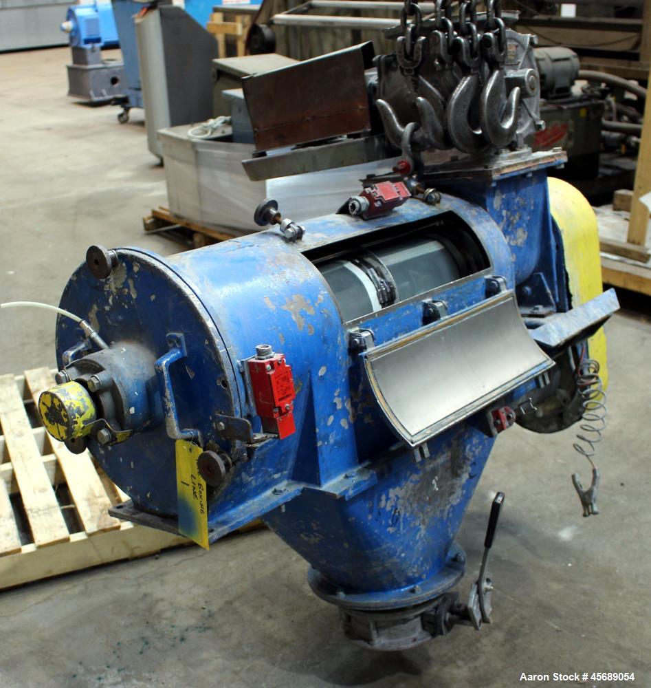 Used Centrifugal Sifter, 304 Stainless Steel. Approximate 8" diameter x 24" long screening chamber with a stainless steel helical rotor. Side access door. 6" Bottom fines outlet, 5" end overs outlet,...