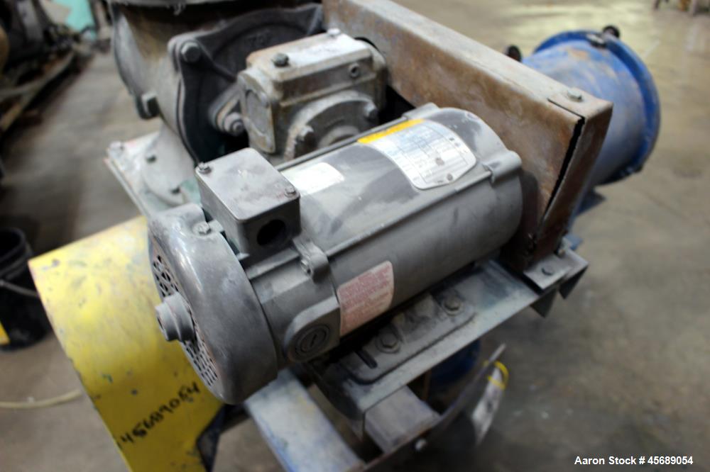 Used Centrifugal Sifter, 304 Stainless Steel. Approximate 8" diameter x 24" long screening chamber with a stainless steel helical rotor. Side access door. 6" Bottom fines outlet, 5" end overs outlet,...