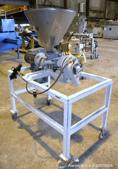 Used Azo Cyclone Screener, model E-240-B1, polypropylene/carbon steel. Approximate 4" diameter x 8" long screen chamber, (4) helical blades. Driven by a 1/2 hp, 3/60/208-230/460 volt, 1140 rpm XP mot...