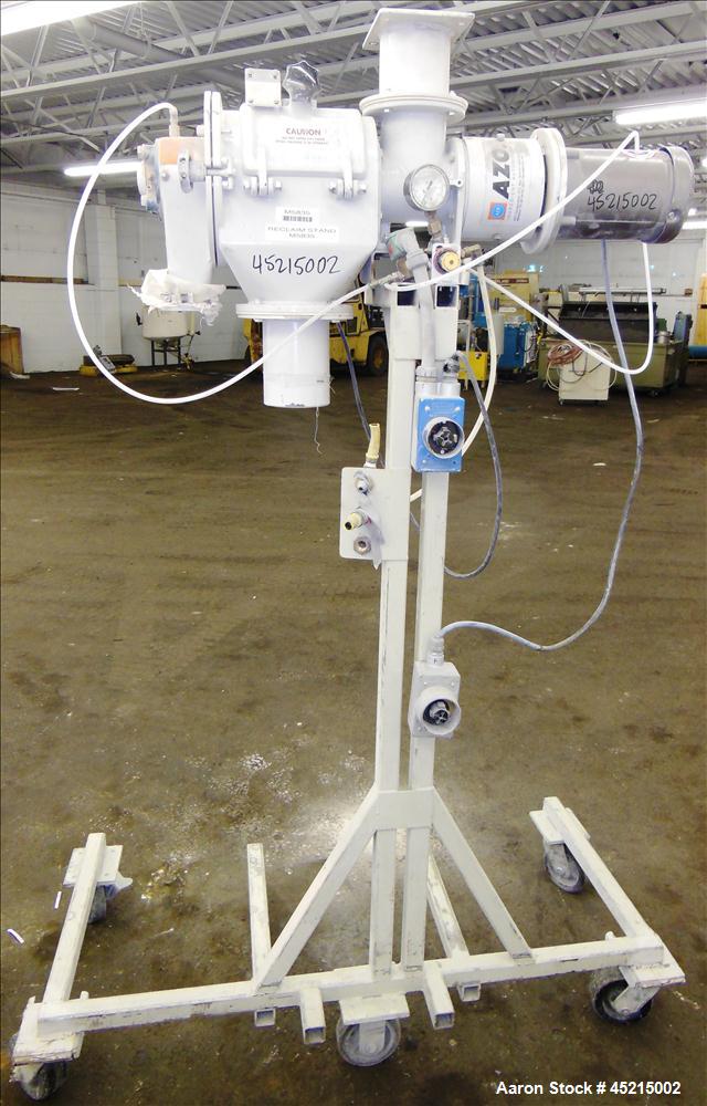 Used Azo Cyclone Screener, Model E-240-B1, aluminum product contact parts. Approximately 4" diameter x 8" long screen chamber, (3) helical blades.  Side access door, 4" top feed, horizontal feed scre...