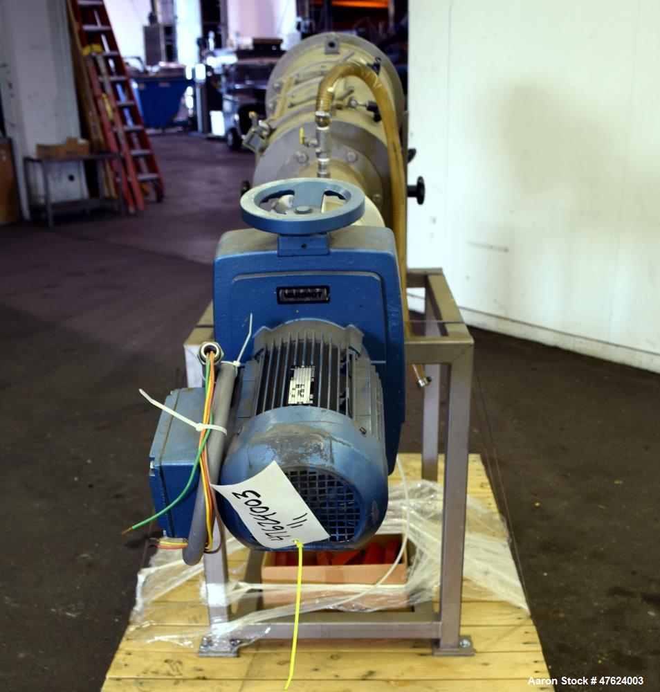 Used Azo FL Liquid Screener, Model FLX-650 LTX, 304 Stainless Steel. Approximate 7" diameter x 24" long screen chamber, internal helical blades with ribbon. Driven by a 4-5hp, 3/60/230/460 volt, 405-...