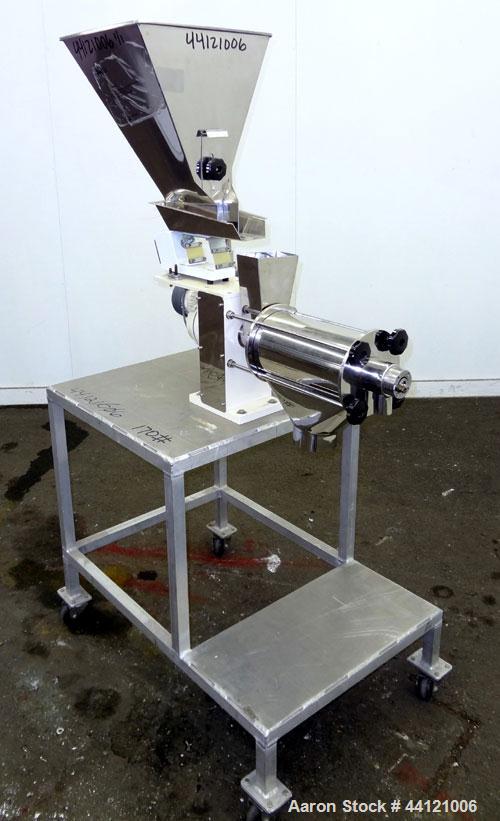 Used KEK Laboratory Centrifugal Rotary Sifter, Stainless Steel. Approximate 2-1/2” diameter x 7” long sifting area with screen, 3 bar rotor, feed screw. Top mounted hopper with a Podmores vibratory h...