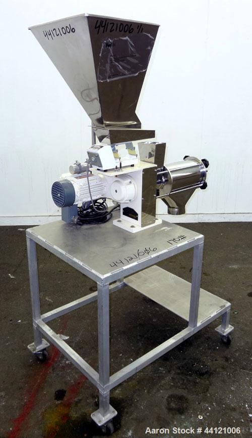 Used KEK Laboratory Centrifugal Rotary Sifter, Stainless Steel. Approximate 2-1/2” diameter x 7” long sifting area with screen, 3 bar rotor, feed screw. Top mounted hopper with a Podmores vibratory h...