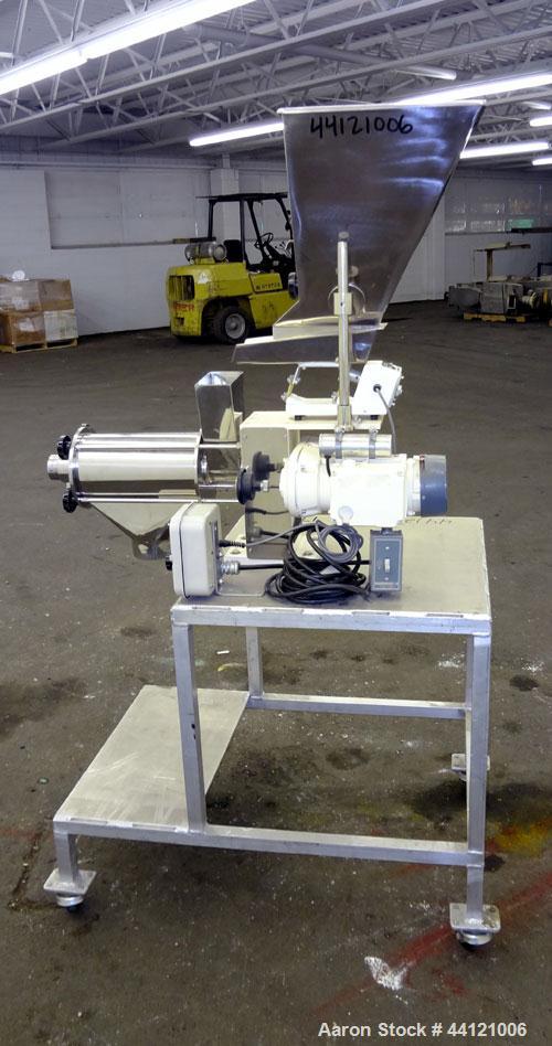 Used KEK Laboratory Centrifugal Rotary Sifter, Stainless Steel. Approximate 2-1/2” diameter x 7” long sifting area with screen, 3 bar rotor, feed screw. Top mounted hopper with a Podmores vibratory h...