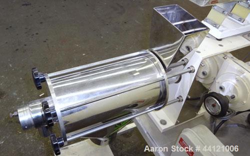 Used KEK Laboratory Centrifugal Rotary Sifter, Stainless Steel. Approximate 2-1/2” diameter x 7” long sifting area with screen, 3 bar rotor, feed screw. Top mounted hopper with a Podmores vibratory h...