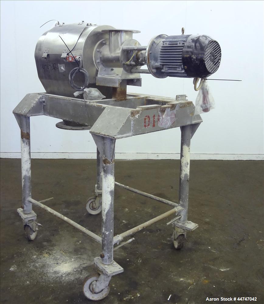 Used KEK Gardner Centrifugal Rotary Sifter, 304 Stainless Steel. Approximate 10" diameter x 21" long sifting area, missing screen, (4) helical blades. Side access door, 6-1/2" top feed, horizontal fe...