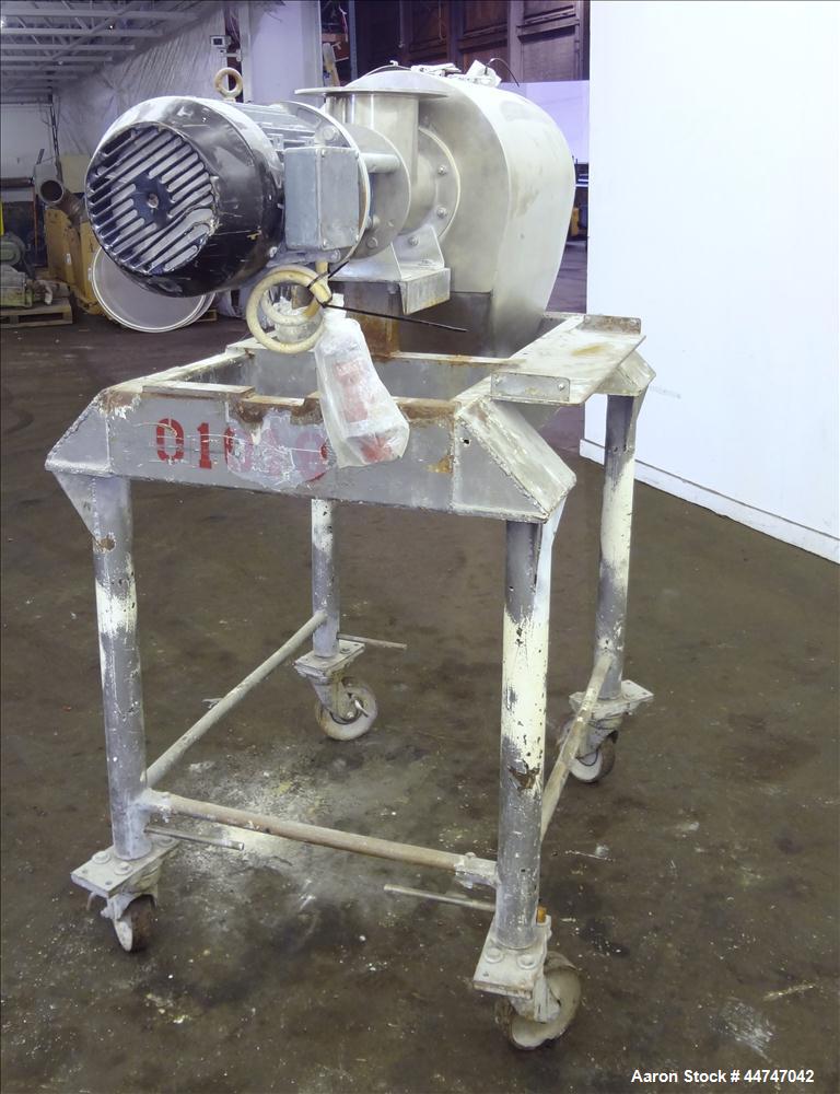 Used KEK Gardner Centrifugal Rotary Sifter, 304 Stainless Steel. Approximate 10" diameter x 21" long sifting area, missing screen, (4) helical blades. Side access door, 6-1/2" top feed, horizontal fe...