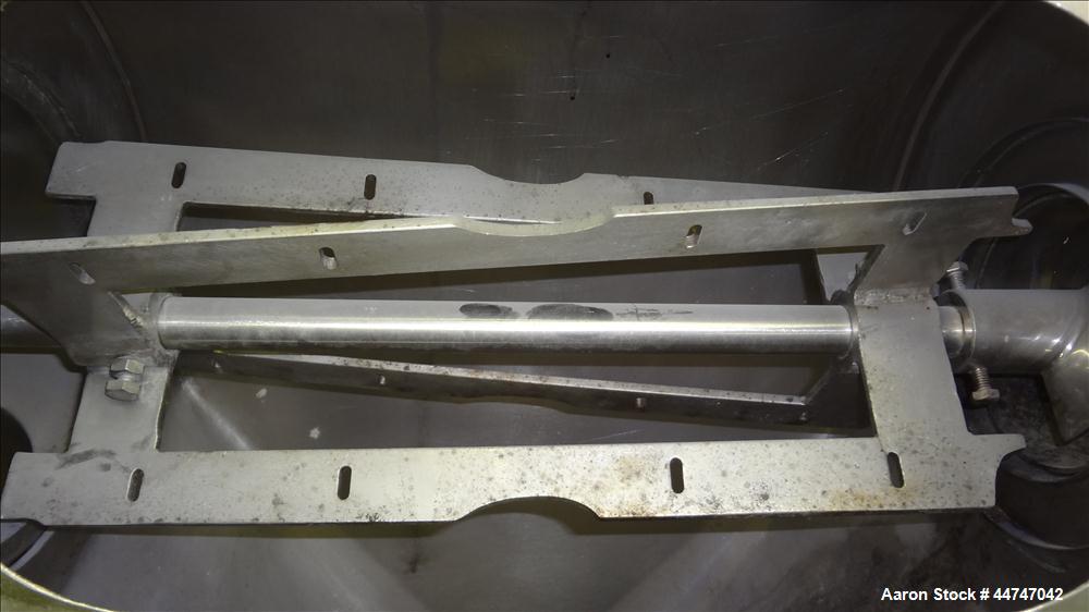 Used KEK Gardner Centrifugal Rotary Sifter, 304 Stainless Steel. Approximate 10" diameter x 21" long sifting area, missing screen, (4) helical blades. Side access door, 6-1/2" top feed, horizontal fe...
