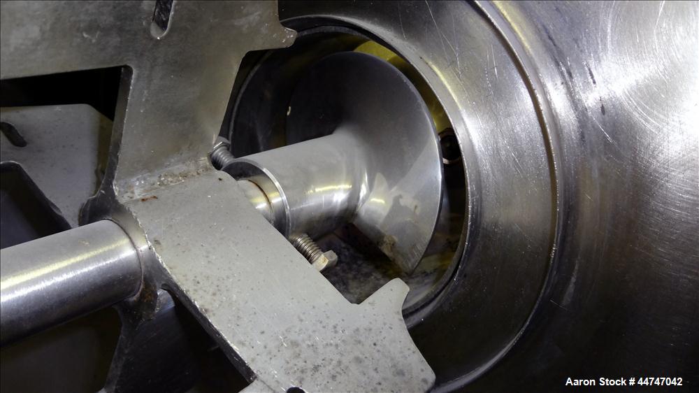 Used KEK Gardner Centrifugal Rotary Sifter, 304 Stainless Steel. Approximate 10" diameter x 21" long sifting area, missing screen, (4) helical blades. Side access door, 6-1/2" top feed, horizontal fe...