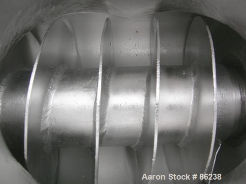 Used Kason Centri-Sifter, 304 Stainless Steel. Approximate 12" diameter x 24" long screen section, (4) helical blades. Approxiamte 6" diameter x 8" long screw feed, driven by a 1.5 HP, 180 Volt DC mo...