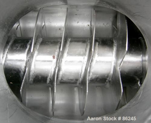 Used Kason Centri-Sifter, 316 Stainless Steel. Approximate 12" diameter x 24" long screen section, (4) helical blades. Approximate 6" diameter x 8" long screw feed, driven by a 1.5 HP, 180 Volt DC mo...