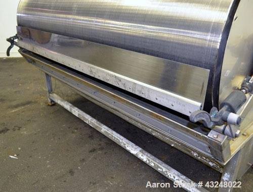 Used Hydrocyclonics Roto Strainer, Model 2572, 304 Stainless Steel. Approximate 25" diameter x 72" wide wedge wire screen. Driven by a .44-.5hp gear motor. Includes a bottom holding tank, and a manua...