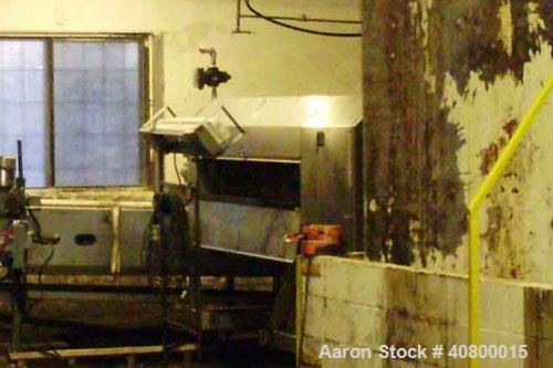 Used Vanmark Equipment Peeler/Washer, Series 2700, Model 02715-008, 304 stainless steel. (8) approximately 5" diameter x 69" long rollers, (7) with nylon brush, (1) abrasive roller, all driven by a 1...