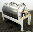 Used Buhler Vibro-Sifter, Model MKVA-56/12K.  Capacity 2000 kg/hr depending on product.  Approximately 22” diameter x 48” long 316 stainless steel vibrating sieve cage, no sieve.  (1) Carbon steel sh...