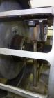 Used Buhler Vibro-Sifter, Model MKVA-56/12K.  Capacity 2000 kg/hr depending on product.  Approximately 22” diameter x 48” long 316 stainless steel vibrating sieve cage, no sieve.  (1) Carbon steel sh...