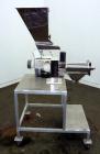 Used KEK Laboratory Centrifugal Rotary Sifter, Stainless Steel. Approximate 2-1/2” diameter x 7” long sifting area with screen, 3 bar rotor, feed screw. Top mounted hopper with a Podmores vibratory h...