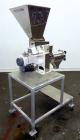 Used KEK Laboratory Centrifugal Rotary Sifter, Stainless Steel. Approximate 2-1/2” diameter x 7” long sifting area with screen, 3 bar rotor, feed screw. Top mounted hopper with a Podmores vibratory h...