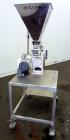 Used KEK Laboratory Centrifugal Rotary Sifter, Stainless Steel. Approximate 2-1/2” diameter x 7” long sifting area with screen, 3 bar rotor, feed screw. Top mounted hopper with a Podmores vibratory h...