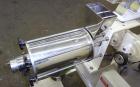Used KEK Laboratory Centrifugal Rotary Sifter, Stainless Steel. Approximate 2-1/2” diameter x 7” long sifting area with screen, 3 bar rotor, feed screw. Top mounted hopper with a Podmores vibratory h...
