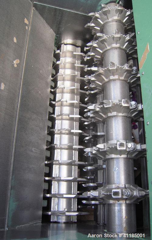 Used Bloapco (Blower Application Co) Shredder, model 3FCS-4058BVA, carbon steel. (4) Shaft unit, approximately 58" x 40" infeed with hopper. Driven by a 40 hp, 3/60/208-230/460 volt, 1770 rpm gearmot...